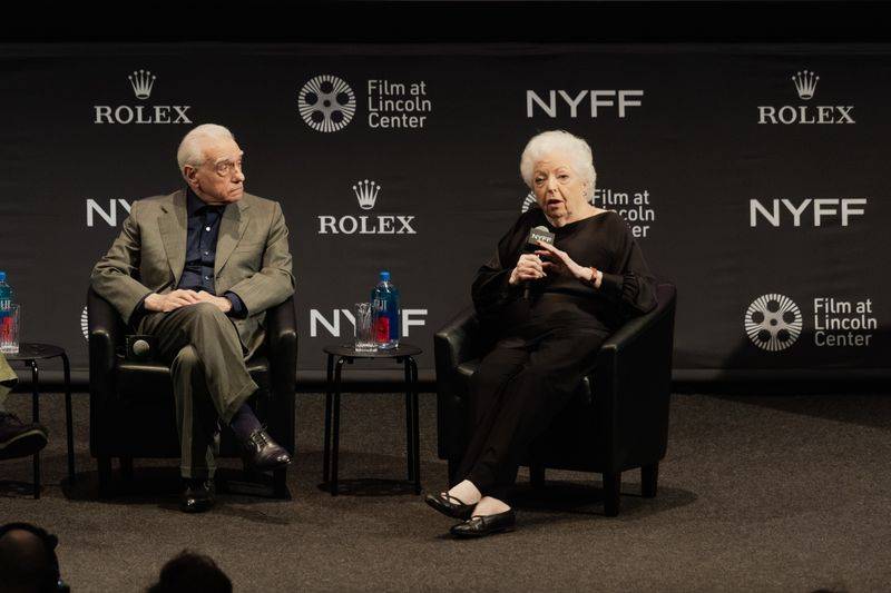 Image may contain: Thelma Schoonmaker, Adult, Person, Conversation, Electrical Device, Microphone, Interview, Cup, and Chair