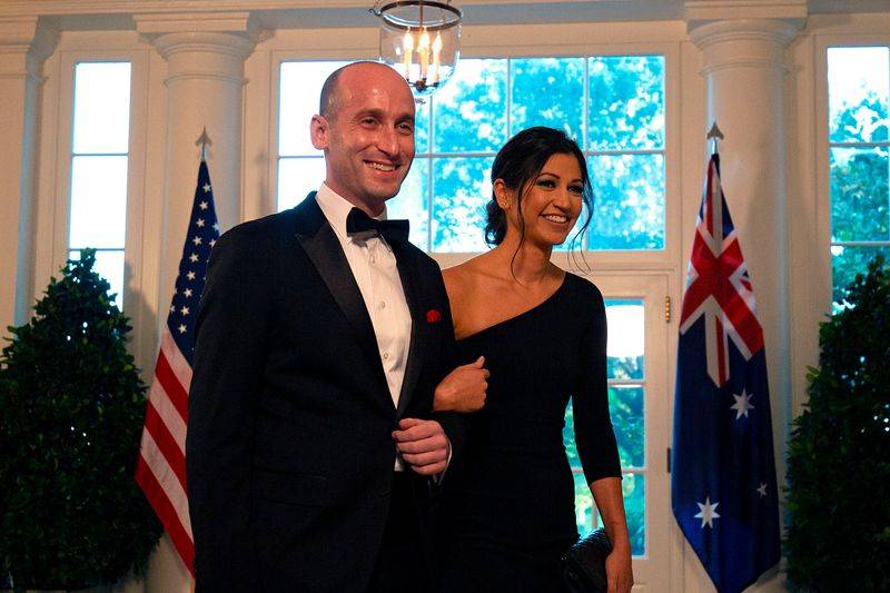 Image may contain: Stephen Miller, Blazer, Clothing, Coat, Formal Wear, Jacket, Suit, Tuxedo, Face, Head, and Person